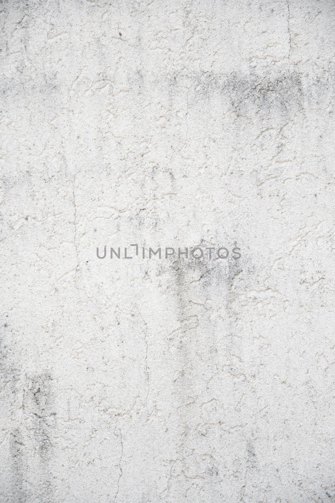 background, gray-white plastered wall with cracks and gray streaks. High quality photo