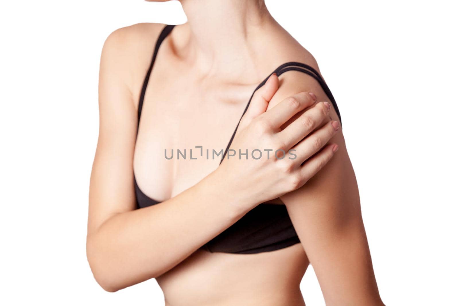 young woman with pain on her arm and shoulder on white background.