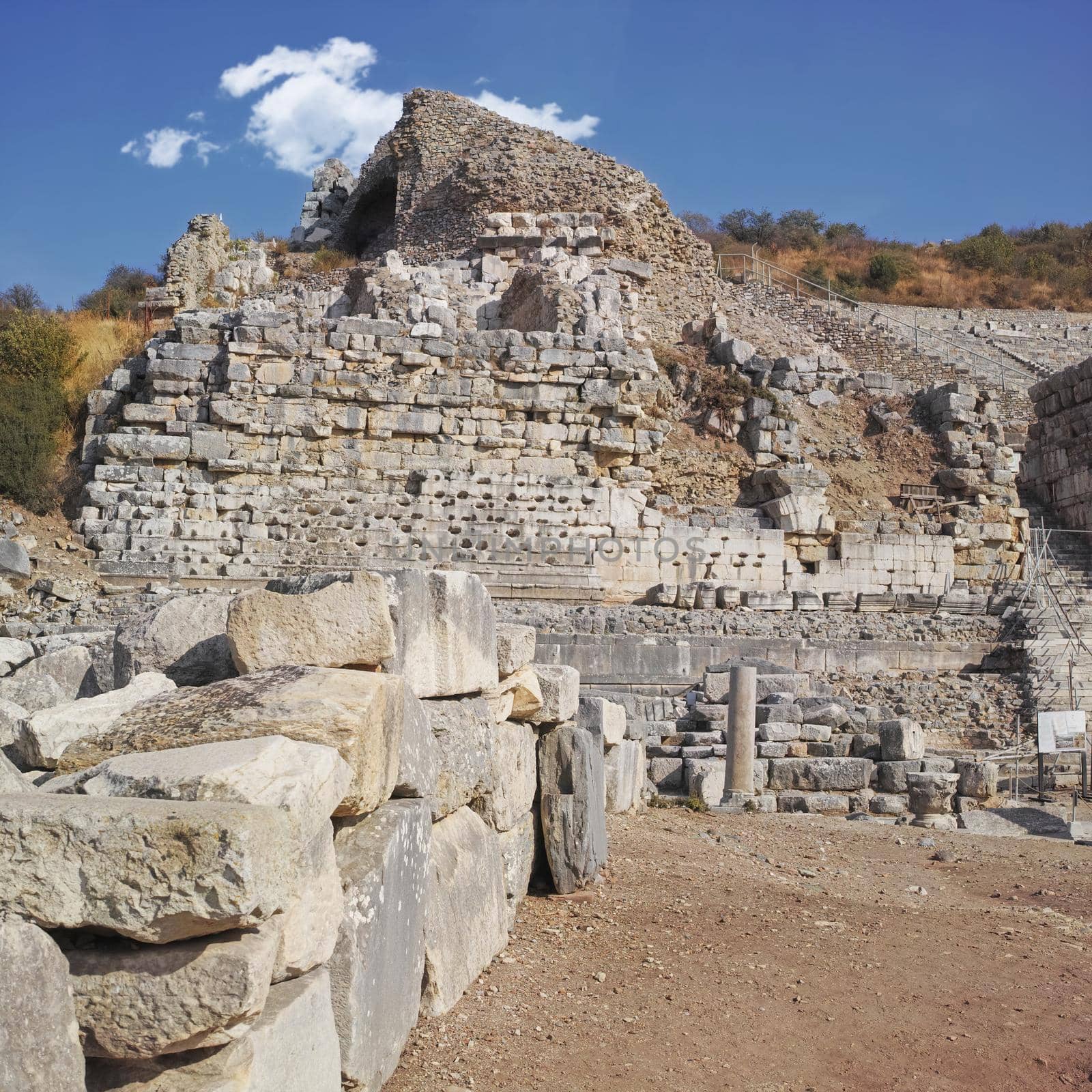 Ancient city ruins of Ephesus in Turkey during the day. Travel abroad and overseas for holiday, vacation and tourism. Excavated remains of historical building stone from Turkish history and culture by YuriArcurs