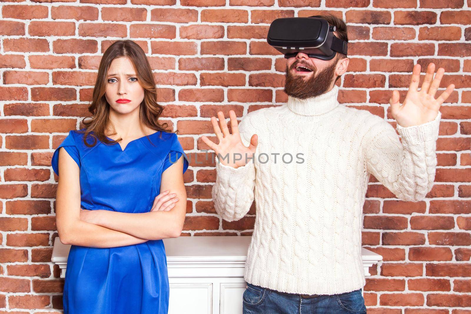 man using vr headset and his wife is angry. by Khosro1