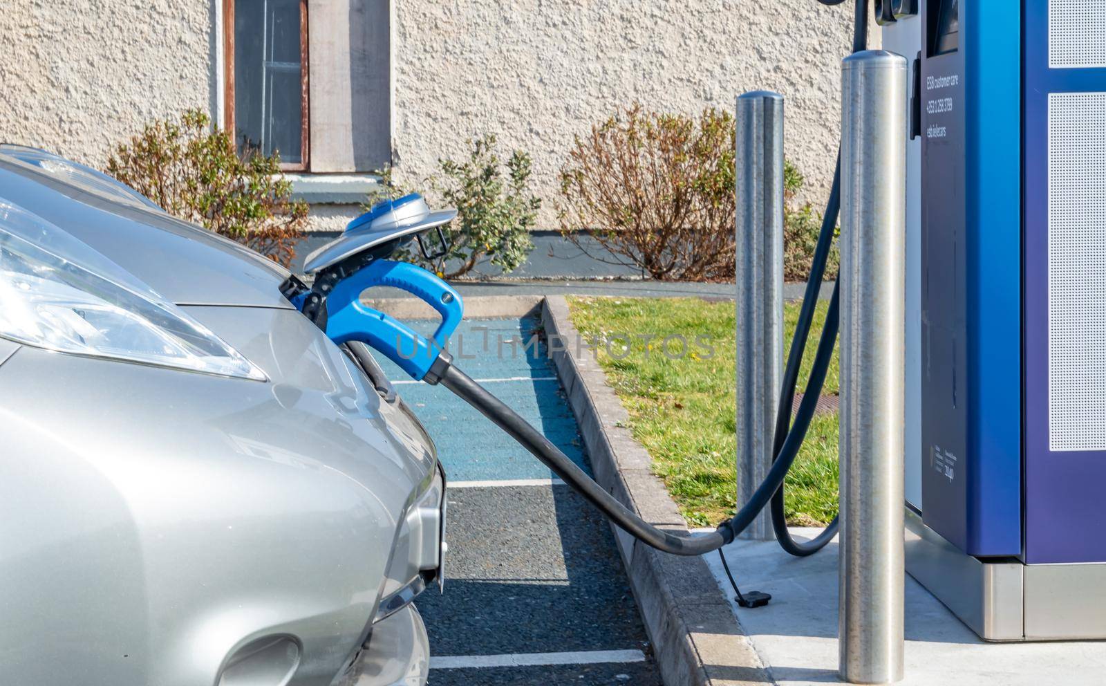 Dungloe, County Donegal, Ireland - April 10 2022 : Electric Car on charching station by TLC_Automation