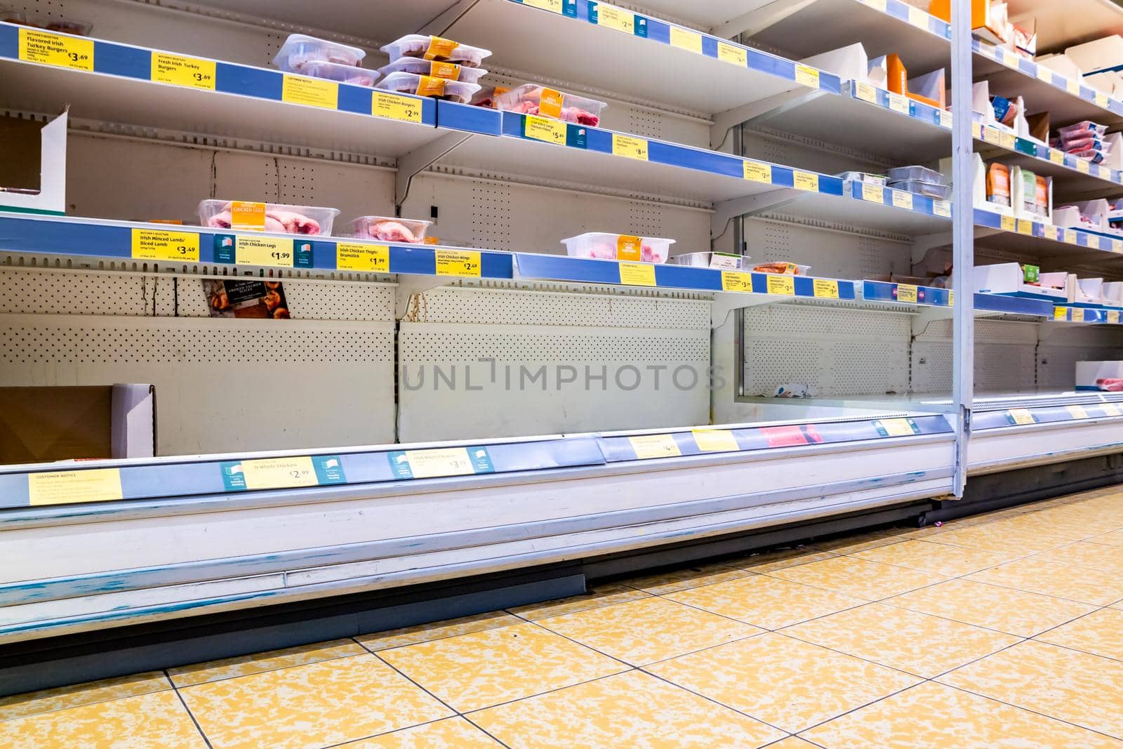 DUNGLOE / IRELAND - MARCH 17 2020 : The chicken shelves are empty during the coronavirus outbreak.