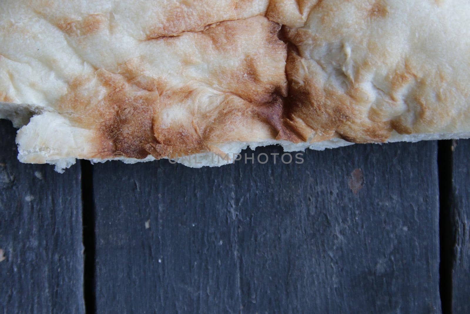 Georgian bread lavash on vintage dark rustic background