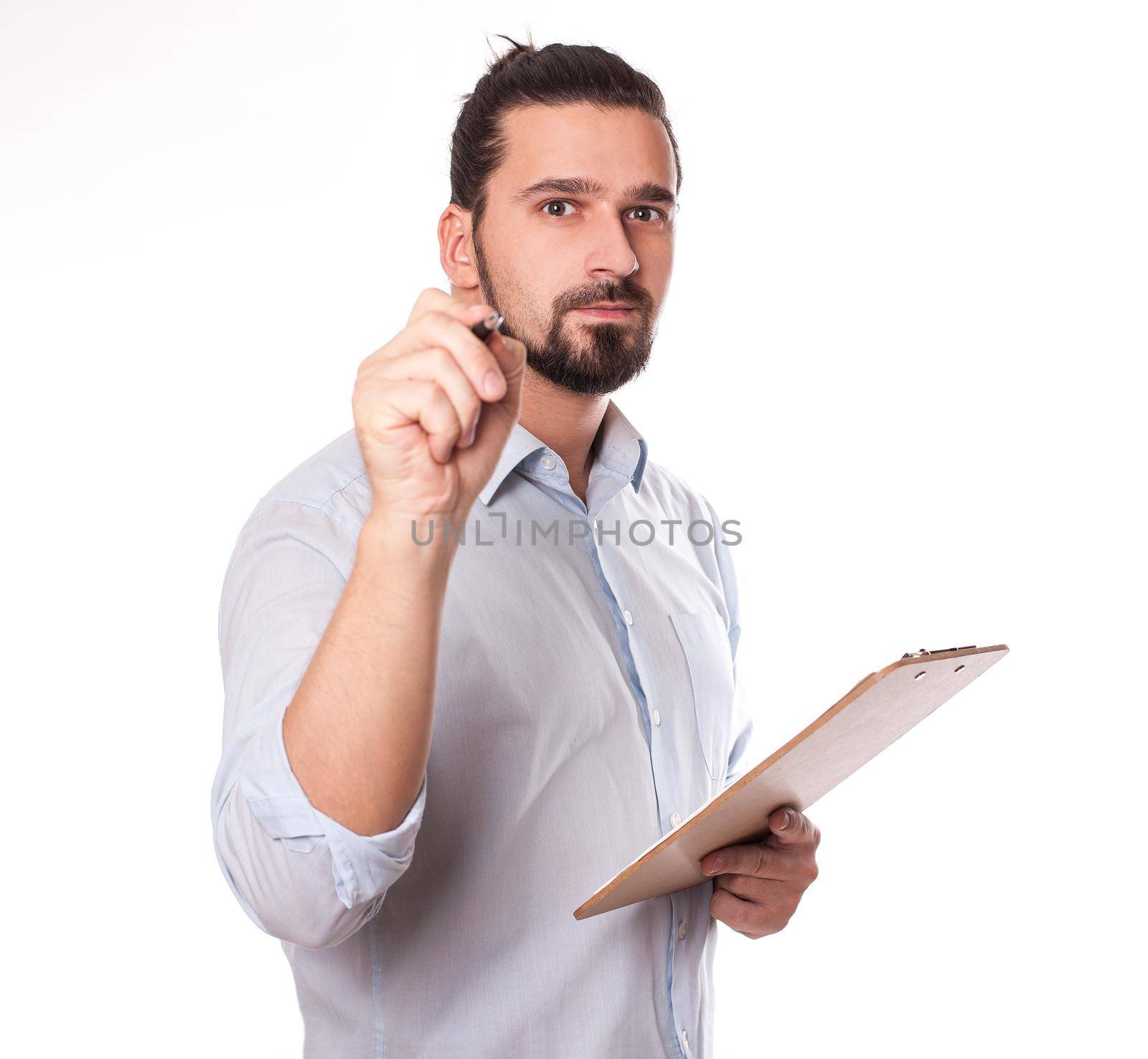 Businessman Writing on a Clipboard, Isolated. Young Man with Hair Bun. Stock image