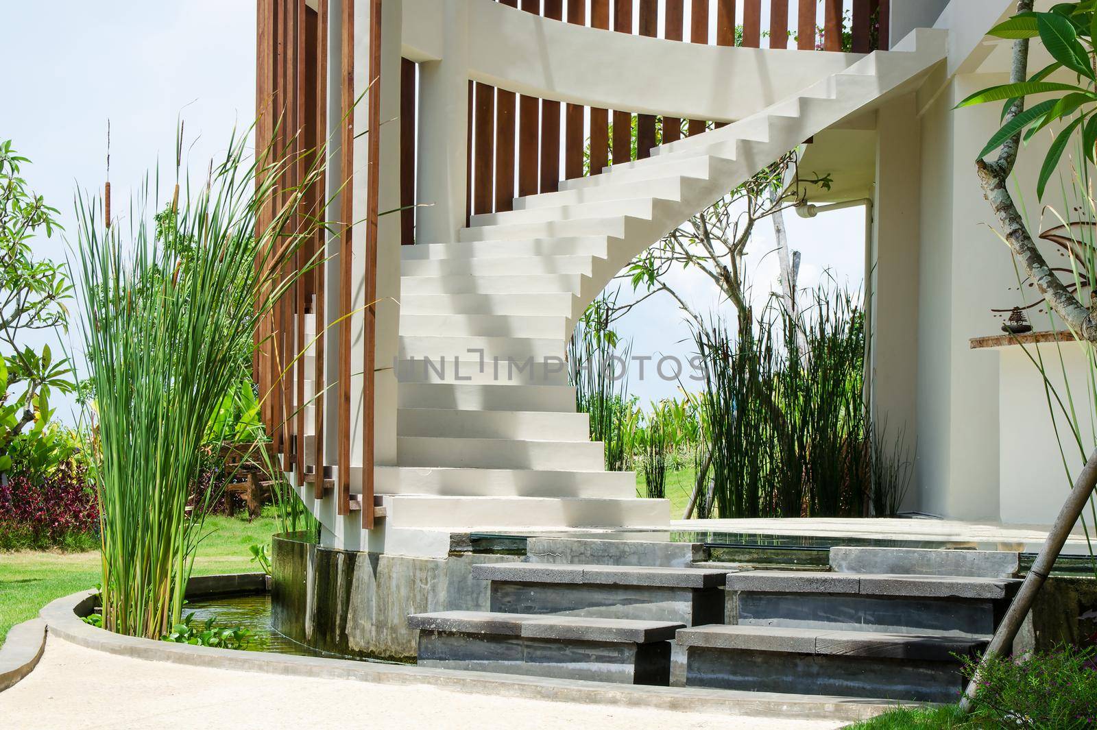 White spiral staircase overlooking the street. Stock image