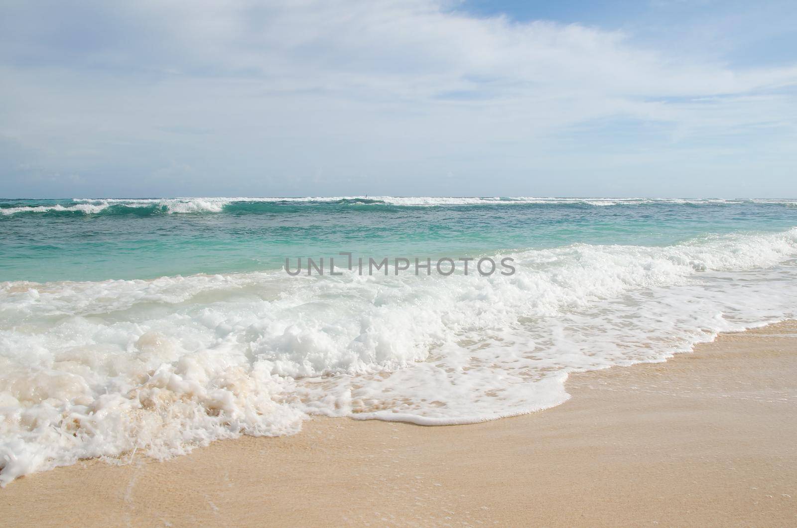 Beach scene with sand, sea and sky by Jyliana