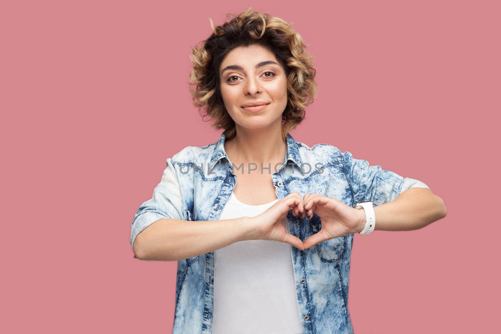 Portrait of emotional young woman on pink background. by Khosro1