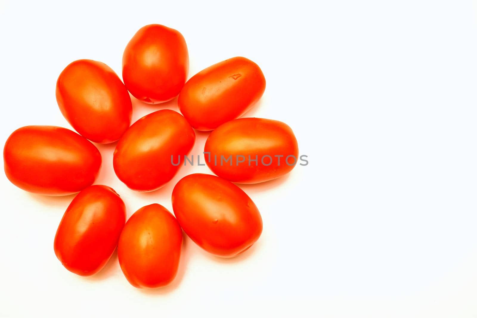 a glossy red, or occasionally yellow, pulpy edible fruit that is eaten as a vegetable or in salad.Juicy ripe tomatoes isolated on the white background, space for notes
