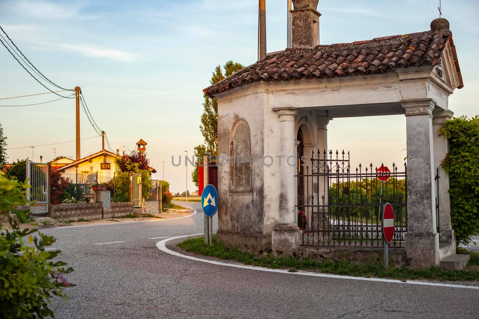 Road junction of a country town by pippocarlot