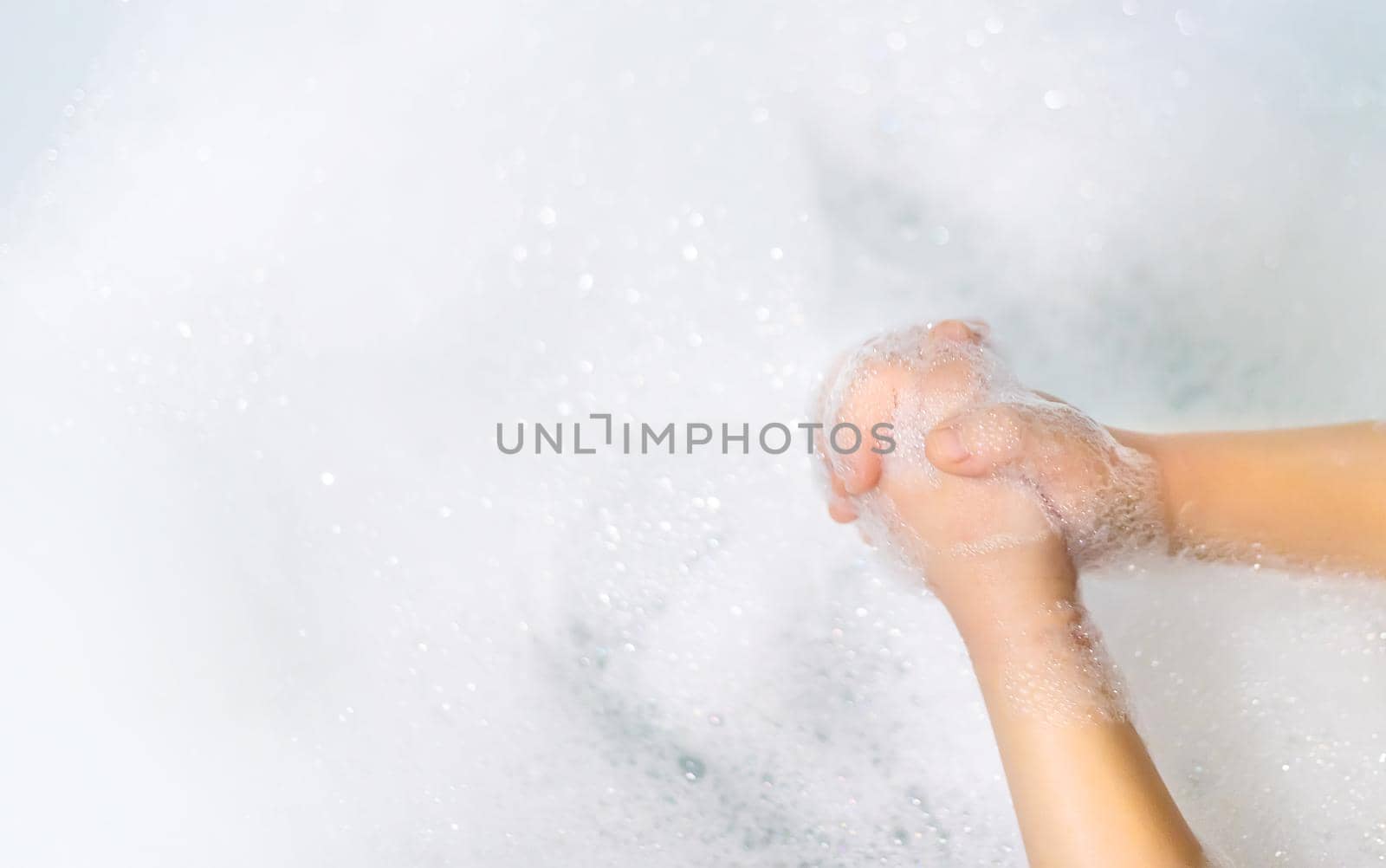 Wash hands thoroughly with soapy water. Selective focus. Hands.