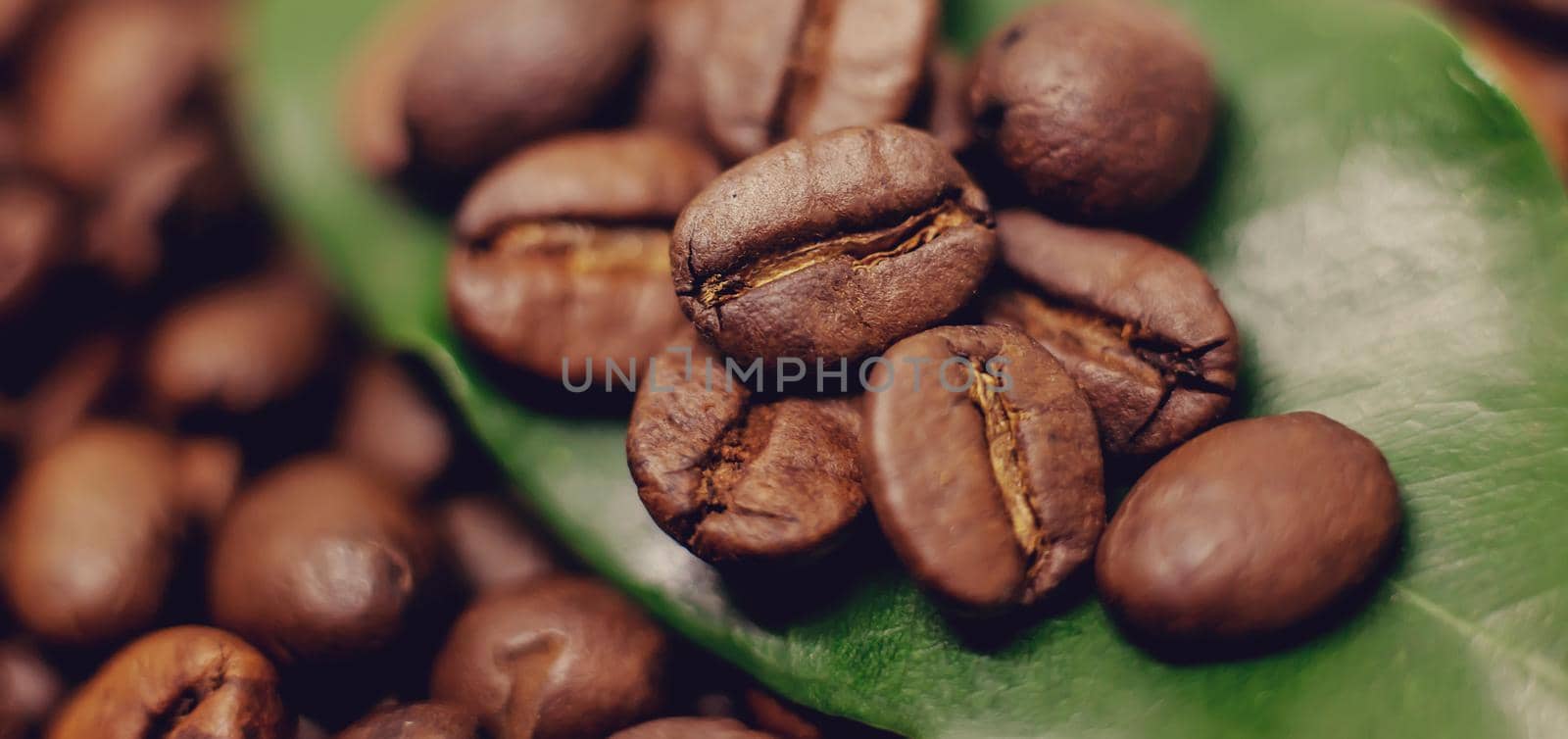 Coffee beans roasted close-up. Drink. Selective focus. Food.