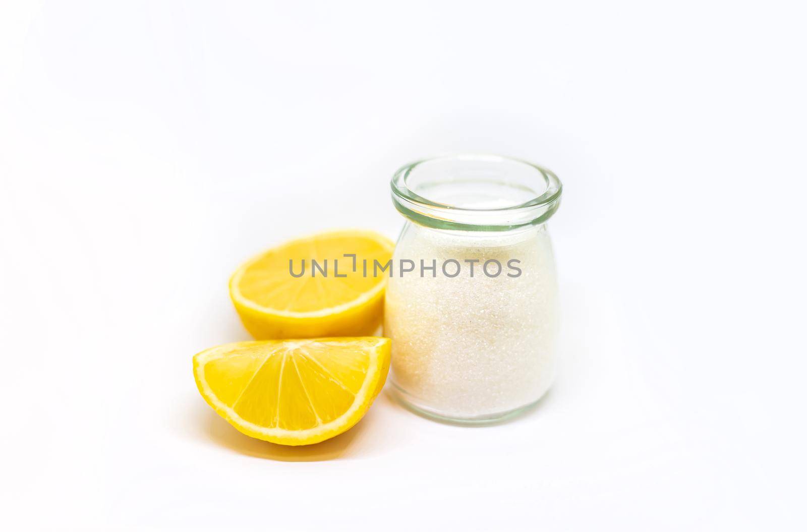 Citric acid on a white isolated background. Selective focus. Food.