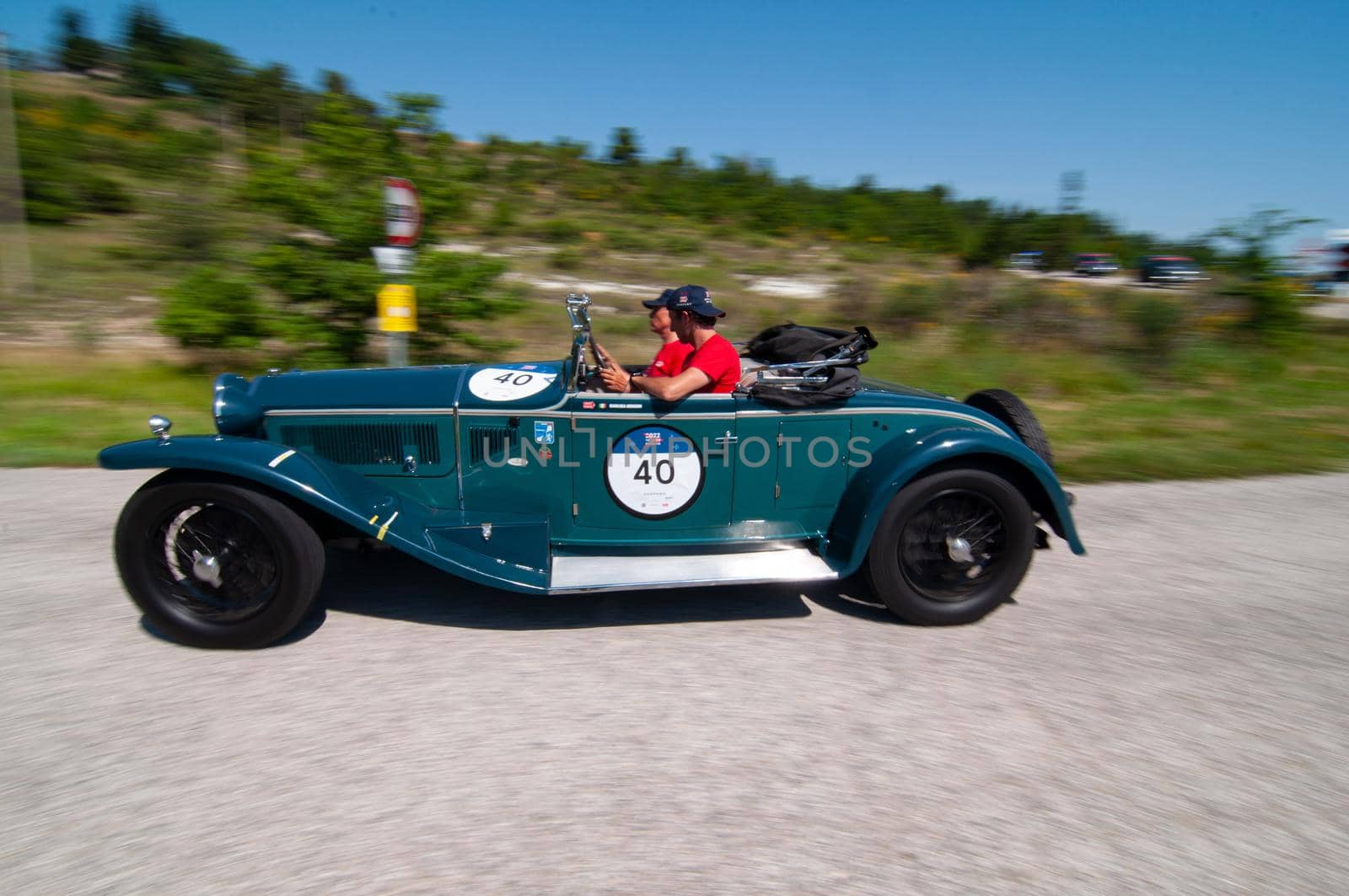URBINO, ITALY - JUN 16 - 2022 : LANCIA LAMBDA SPIDER TIPO 221 CASARO 1929 on an old racing car in rally Mille Miglia 2022 the famous italian historical race (1927-1957 on an old racing car in rally Mille Miglia 2022 the famous italian historical race (1927-1957