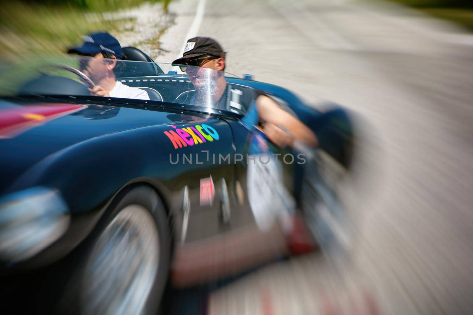 URBINO, ITALY - JUN 16 - 2022 : FERRARI 166 MM SPIDER VIGNALE 1953 on an old racing car in rally Mille Miglia 2022 the famous italian historical race (1927-1957