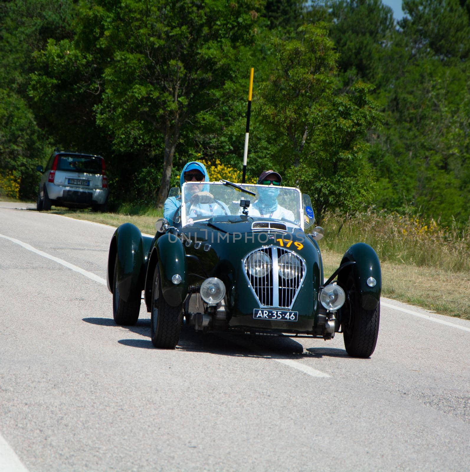 URBINO, ITALY - JUN 16 - 2022 : HEALEY 2400 SILVERSTONE (D-TYPE) 1950 on an old racing car in rally Mille Miglia 2022 the famous italian historical race (1927-1957