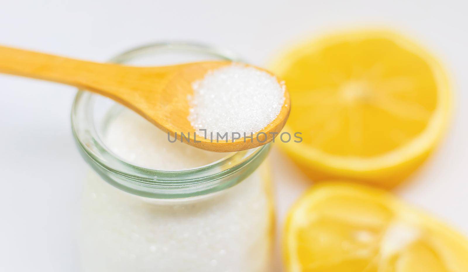 Citric acid on a white isolated background. Selective focus. Food.