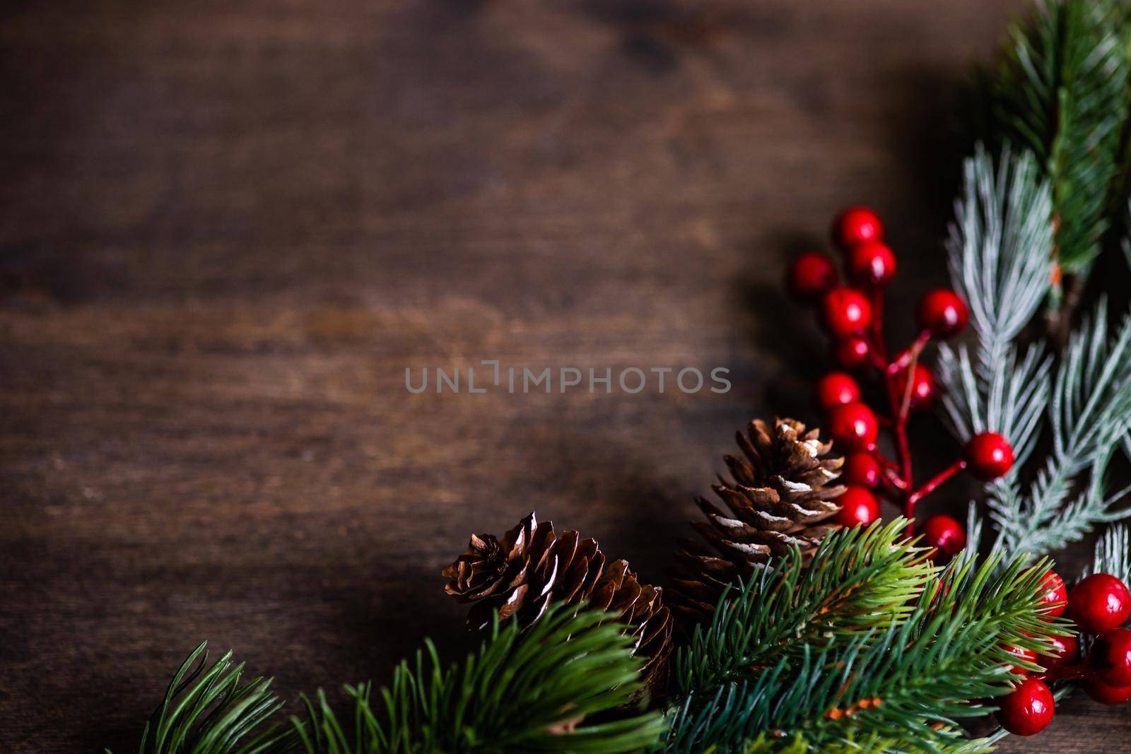 Christmas card concept with xmas tree and decor on wooden background with copy space