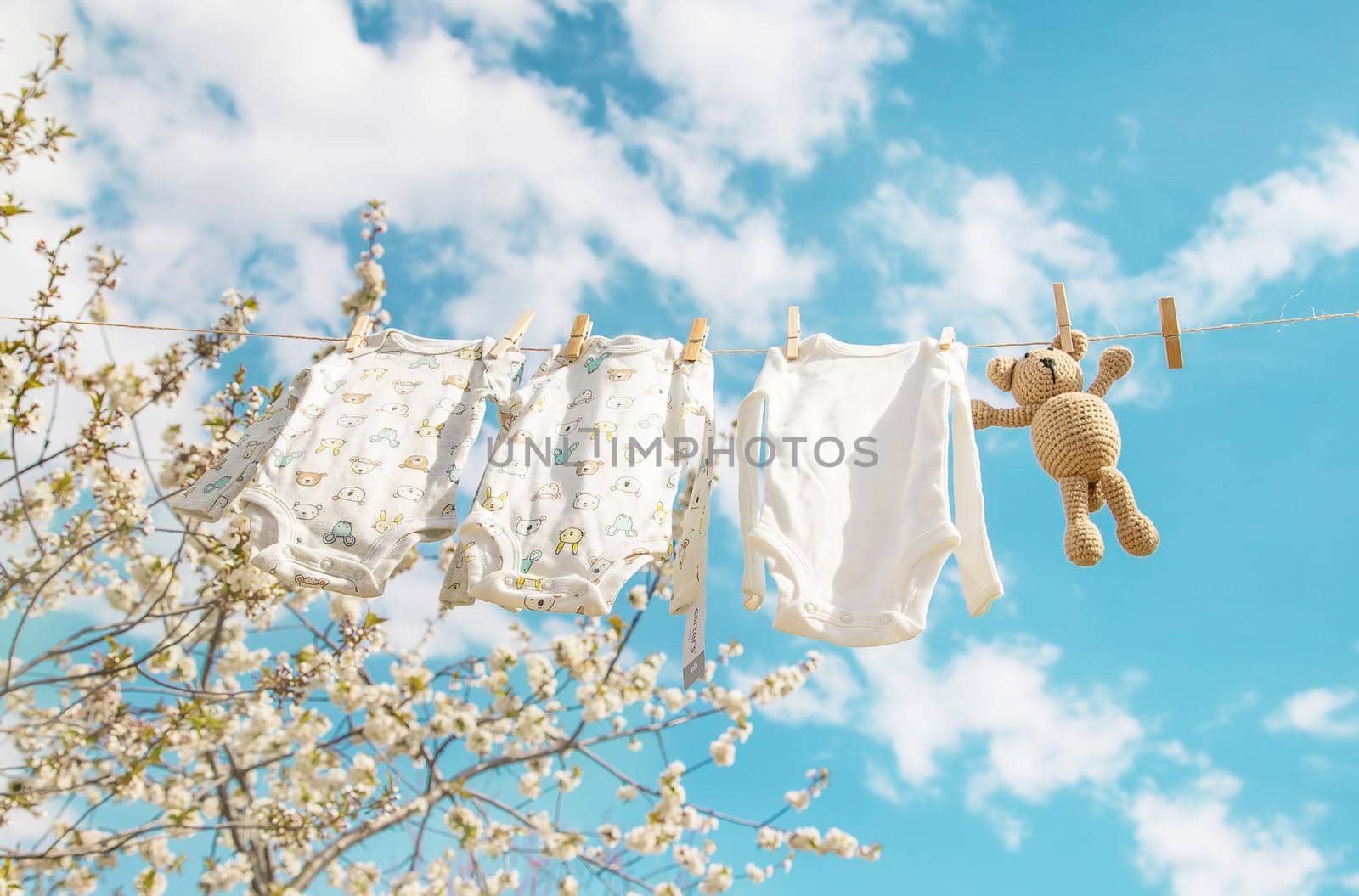 Baby clothes are drying on the street. Selective focus. nature.