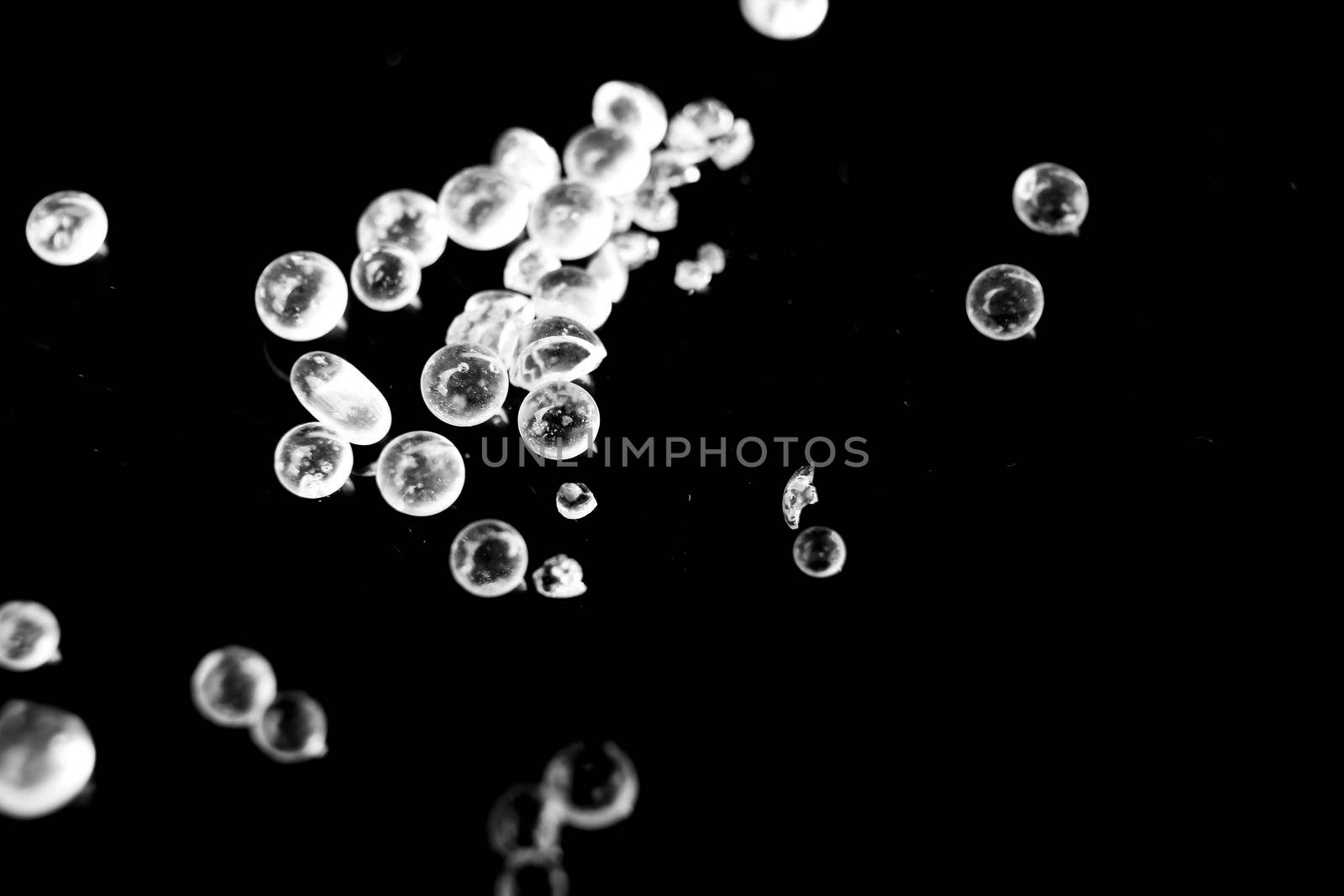 Silica Gel Beads on black background by soniabonet