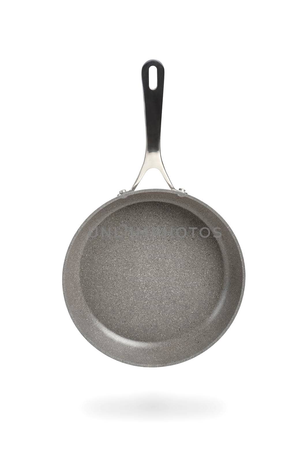 Black frying pan isolated on white background. Frying pan with non-stick coating.Non-stick frying pan made of titanium and granite. Isolate with shadow.