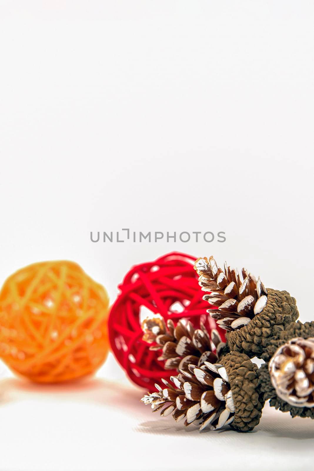 Christmas isolate on white, cones and red berries are laid out on a white background. For print, postcard, design with place for text. by SERSOL