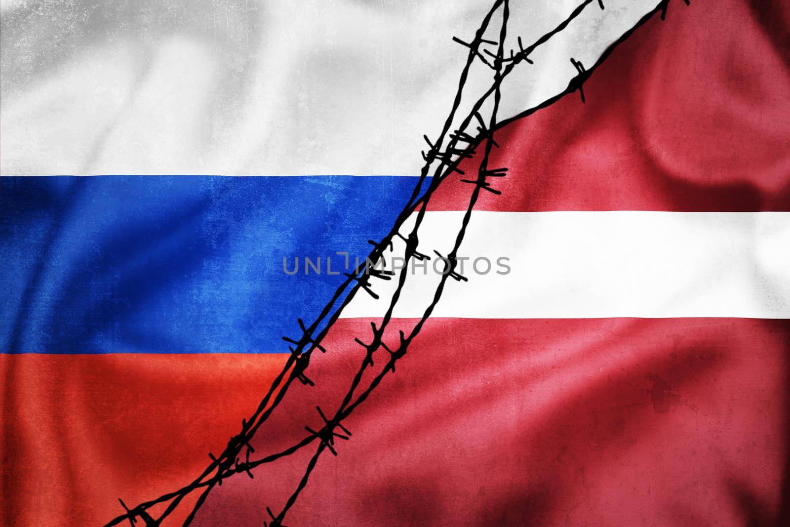 Grunge flags of Russian Federation and Latvia divided by barb wire illustration, concept of tense relations between west and Russia