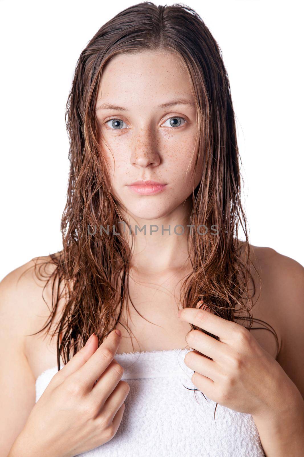 Portrait of a beautiful model with wet hair and clean skin and freckles after shower by Khosro1