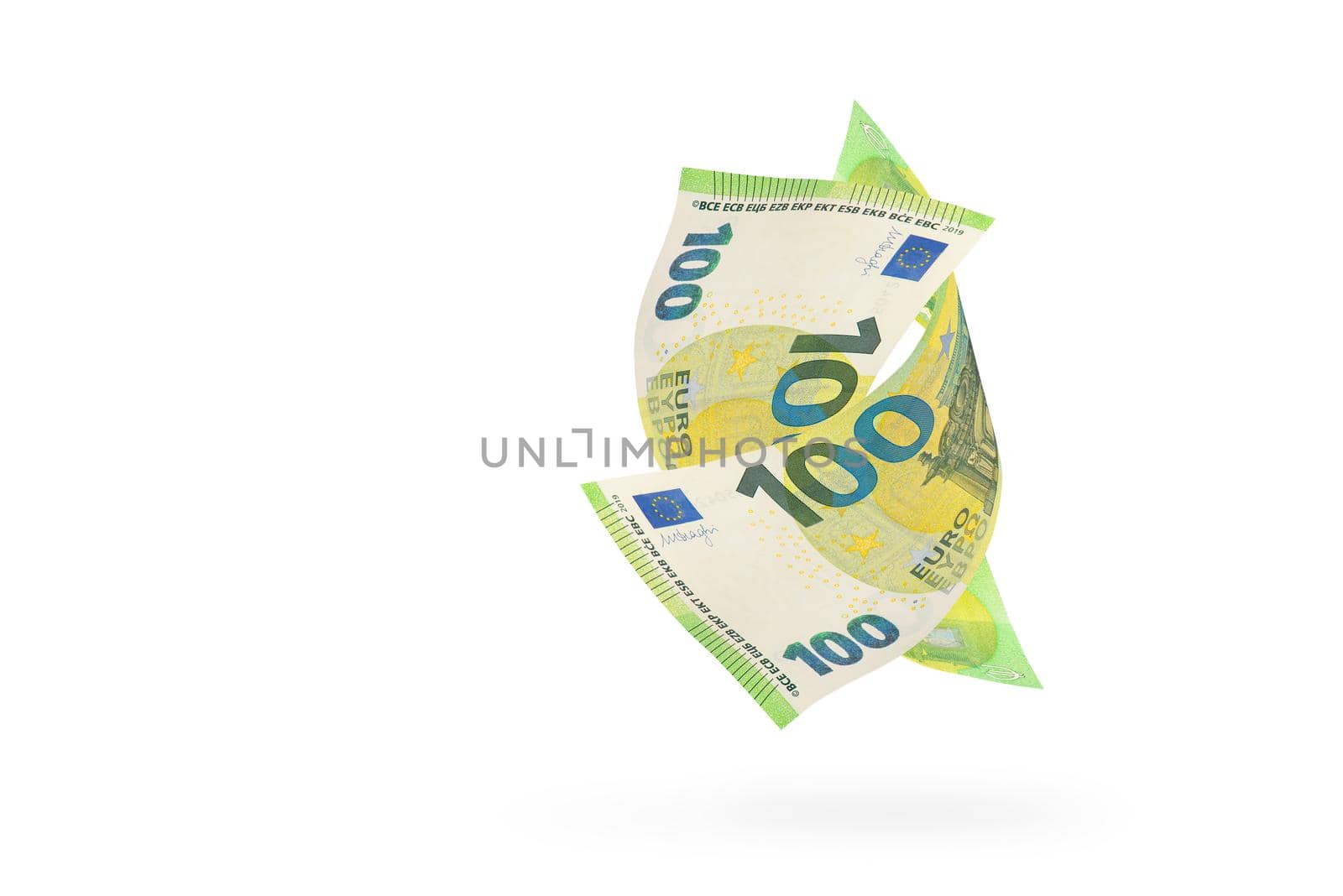One hundred euro banknote isolated on white background. European money folded in half, close-up of money casts a shadow. Two euro banknotes intertwined in the air.