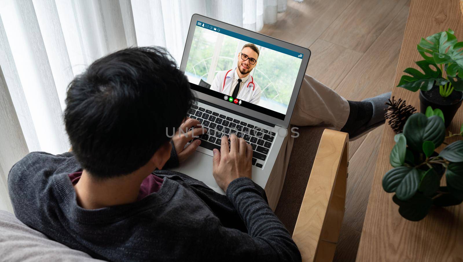 Doctor video call online by modish telemedicine software application for virtual meeting with patient