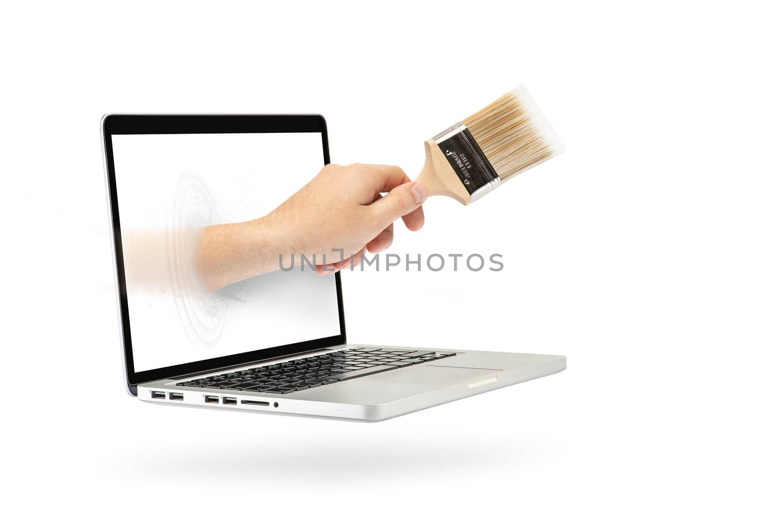 A laptop hovers in the air casting a shadow on a white isolated background. White screen for copy space. Computer isolated on white background. A hand with a paint brush crawls out of the screen.