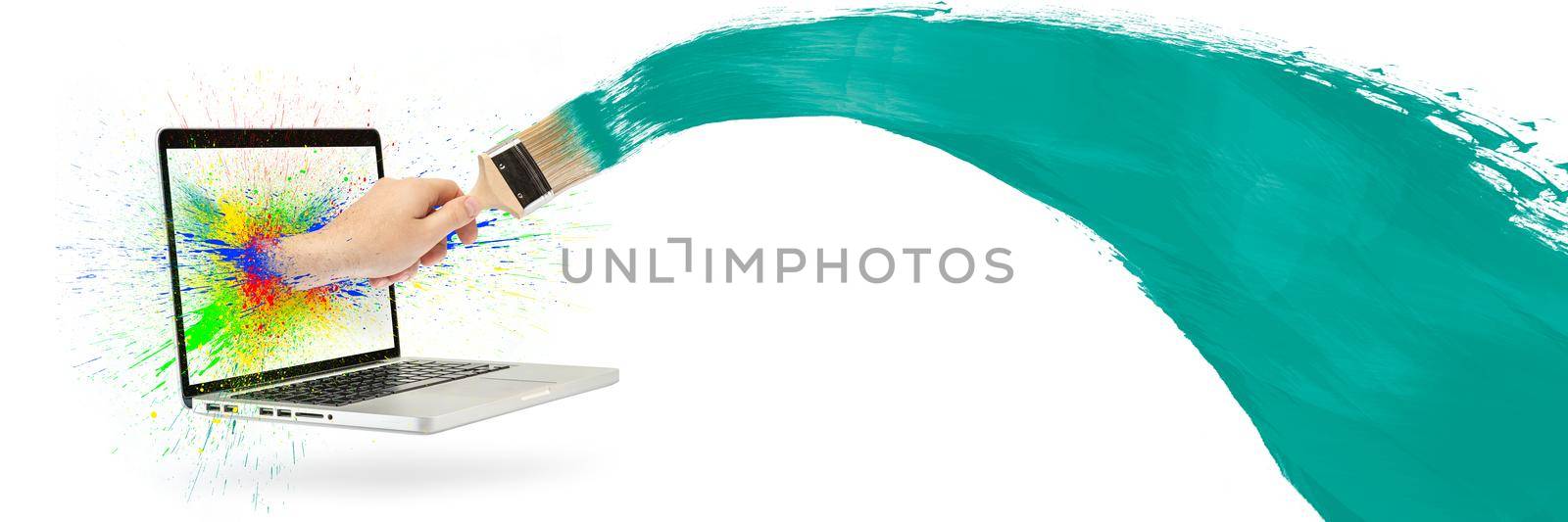 A hand with a paintbrush sticks out of the laptop screen. Isolated on white. Splashes of multi-colored paint in different directions. Concept searching for workers for home renovation on the Internet by SERSOL