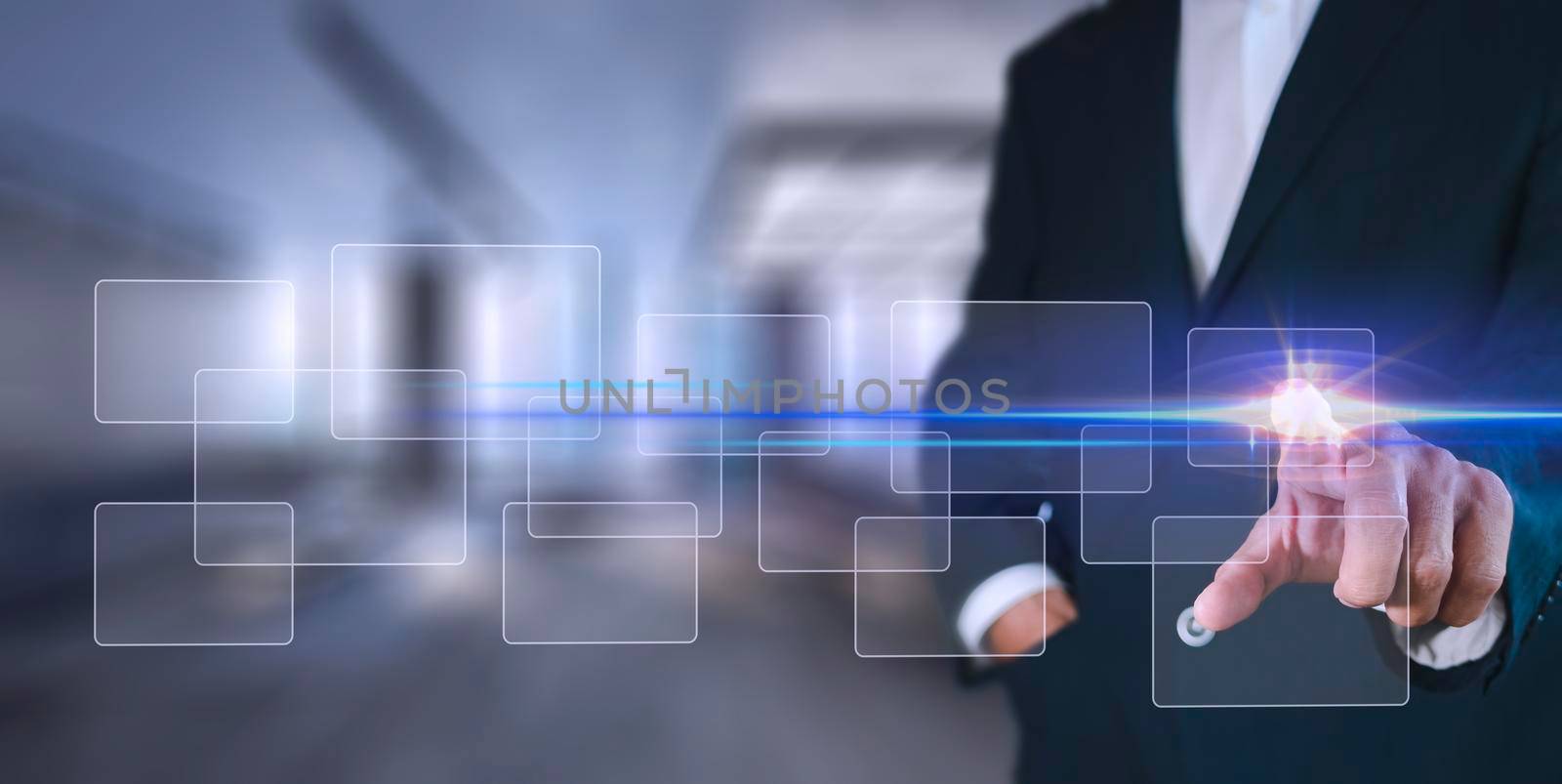 Businessman pressing button on hologram virtual screens with hexagons and transparent. Business technology internet and virtual reality concept.