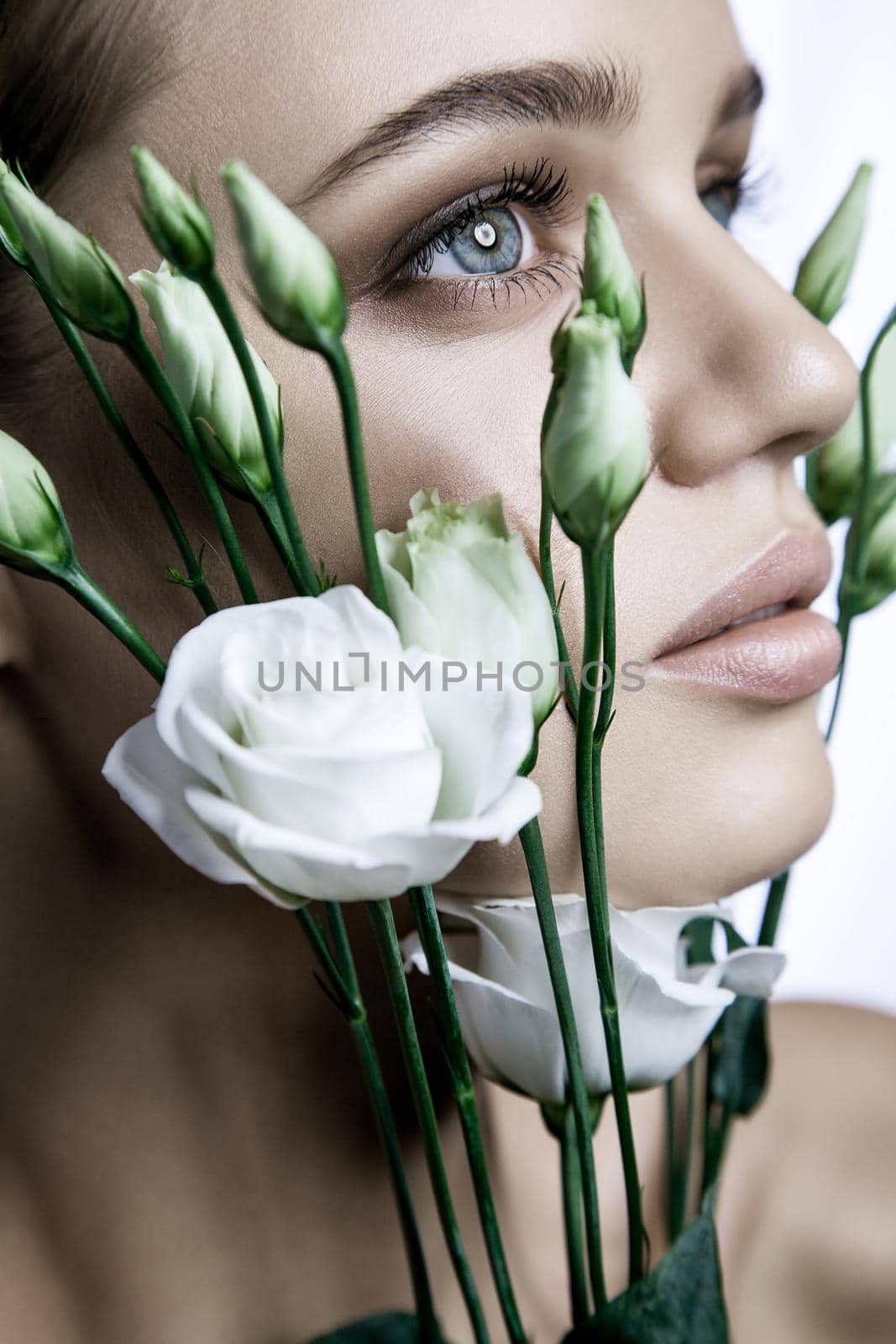 beautiful model with good skin on white background with white roses flower. by Khosro1