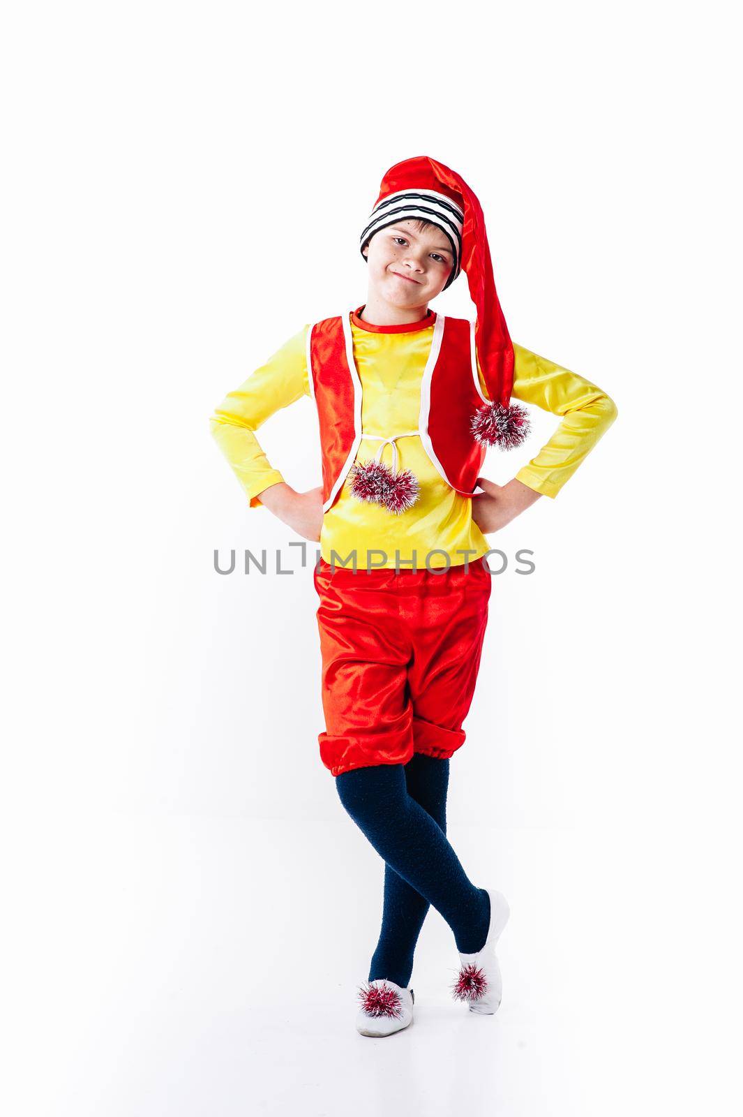 A baby dressed as a elf. isolated. Santa's helper. boy in suit of dwarf or elf by Andrii_Ko