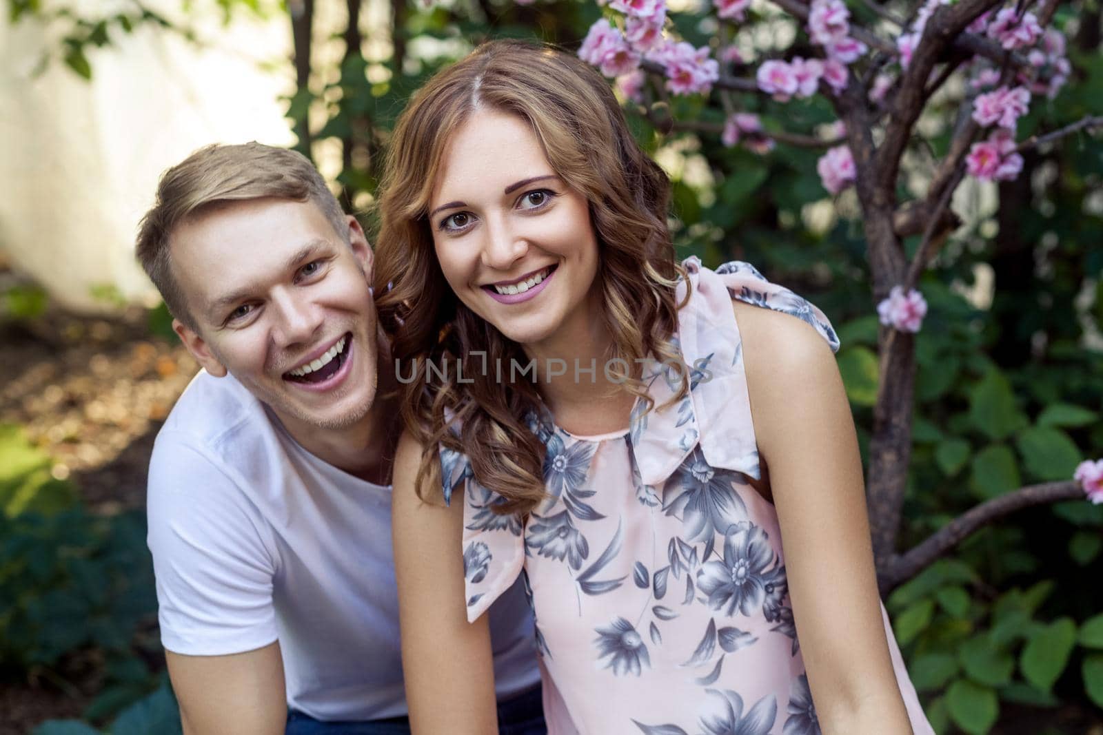 Attractive positive couple toothy smiling at camera by Khosro1