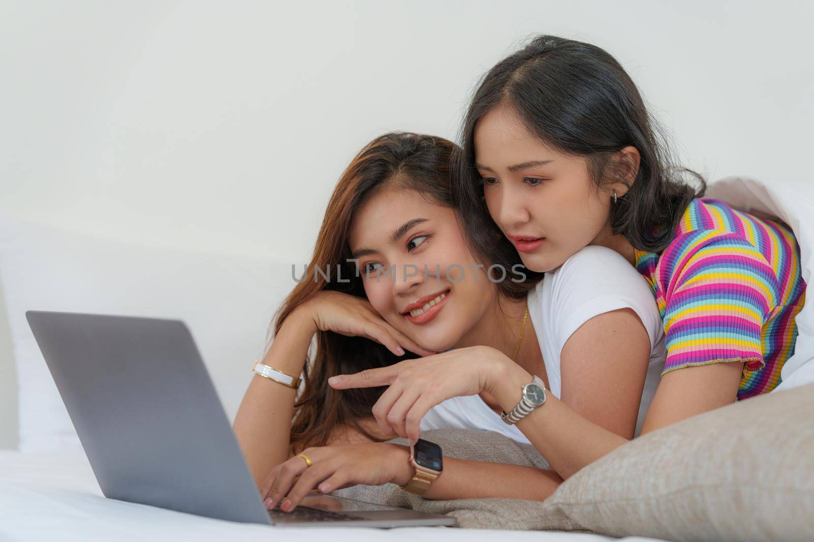 Young Asian Women LGBT lesbian couple love moments happiness at bedroom. LGBTQ or Gay and pride concpet