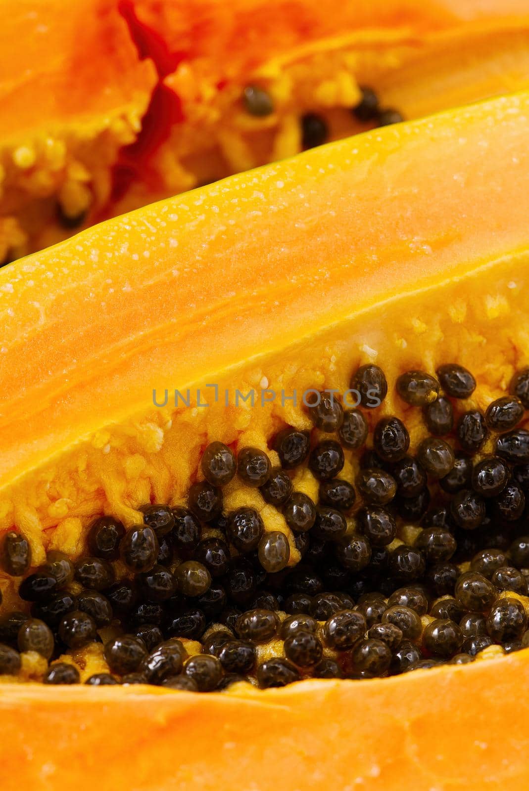 Close up of of ripe papaya. View of the Inside of a Papaya. Sweet tropical fruit. Using as tropical fruits concept.