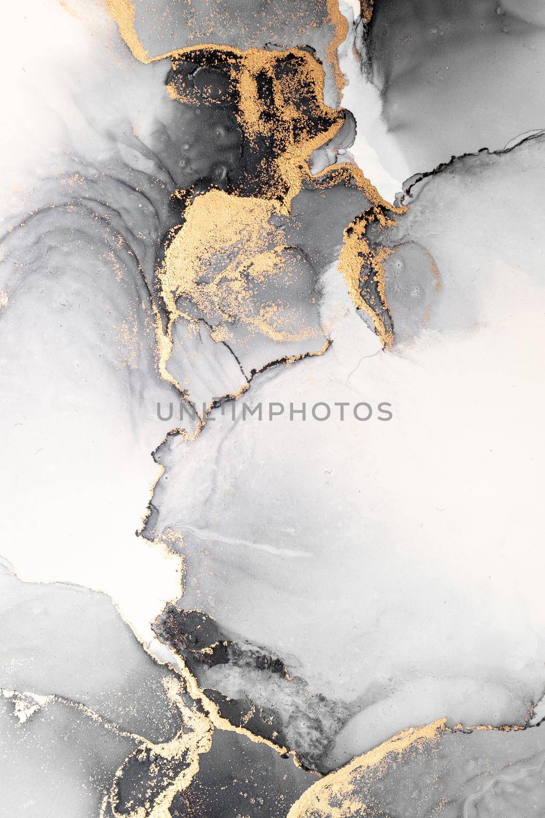 Black gold abstract background of marble liquid ink art painting on paper . Image of original artwork watercolor alcohol ink paint on high quality paper texture .