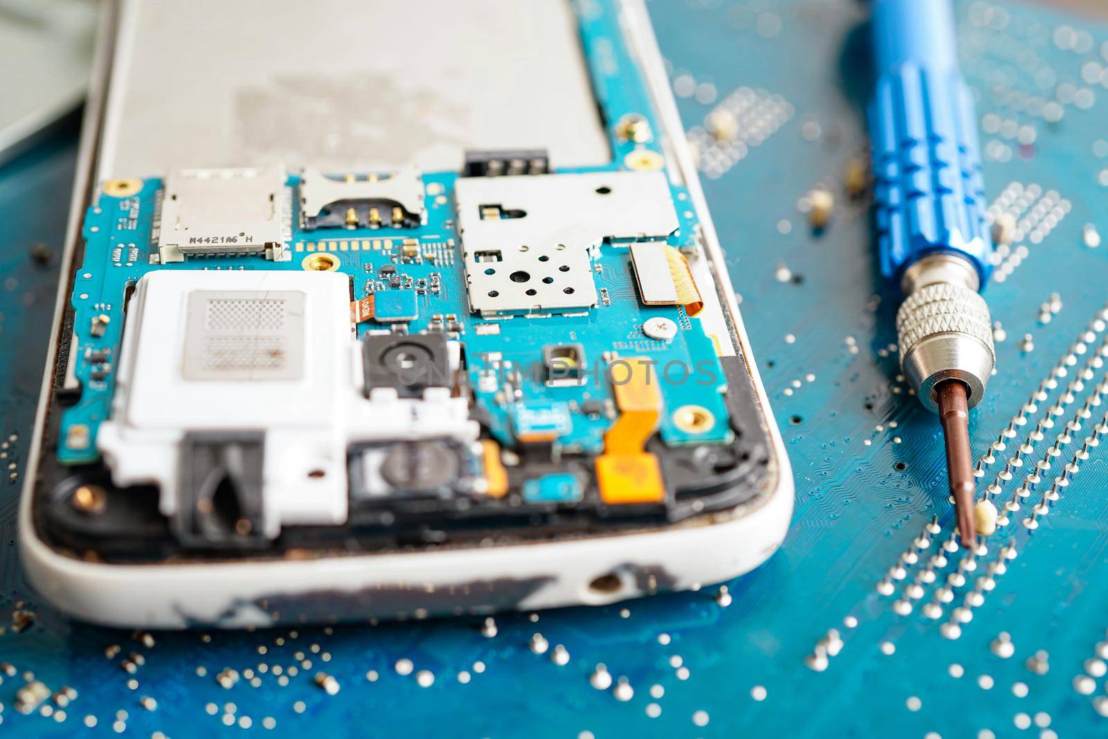 Repairing and upgrade mobile phone, electronic, computer hardware and technology concept.