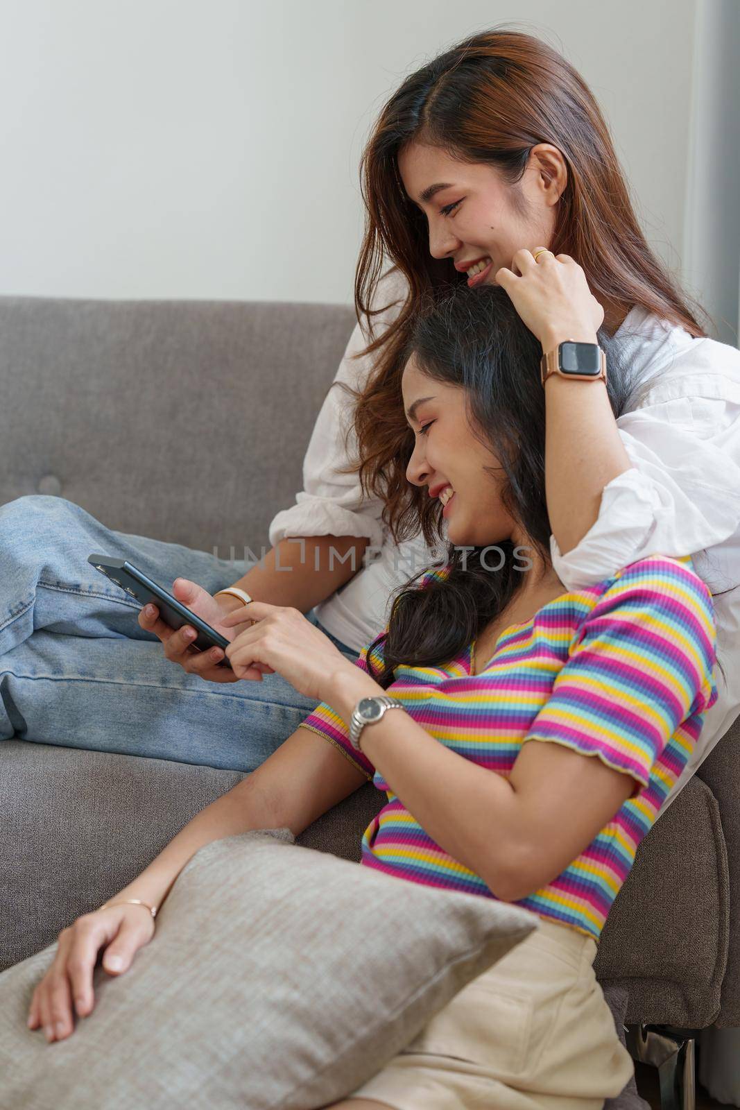 Young Asian Women LGBT lesbian couple love moments happiness at bedroom. LGBTQ or Gay and pride concpet. by itchaznong