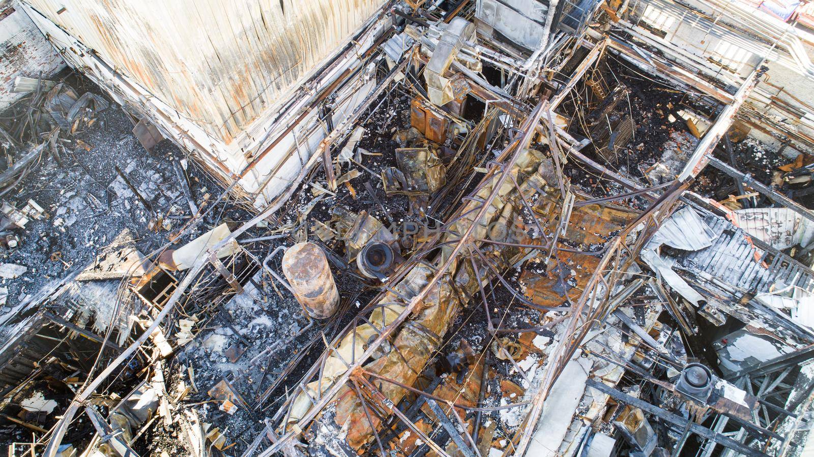 View from above of a damaged building that has been destroyed by fire