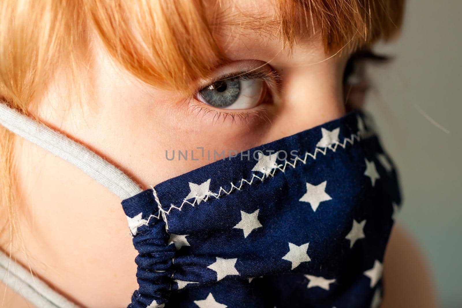 Close up of girl wearing a mask during the pandemic.