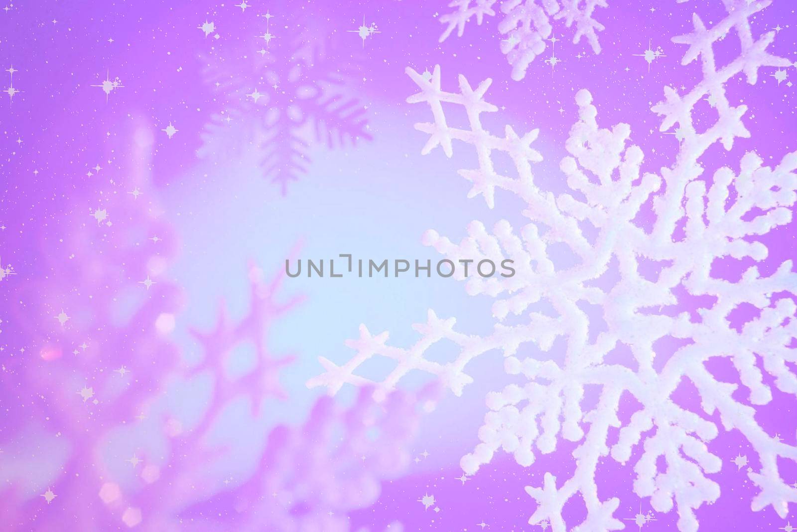 Beautiful festive background with snowflakes for Christmas and New year greetings.