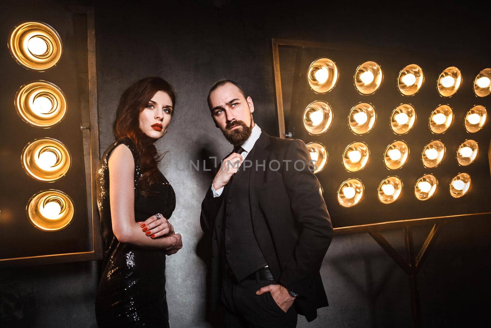 Couple posing near stage and many lamp. Luxury and richly concept. by Khosro1