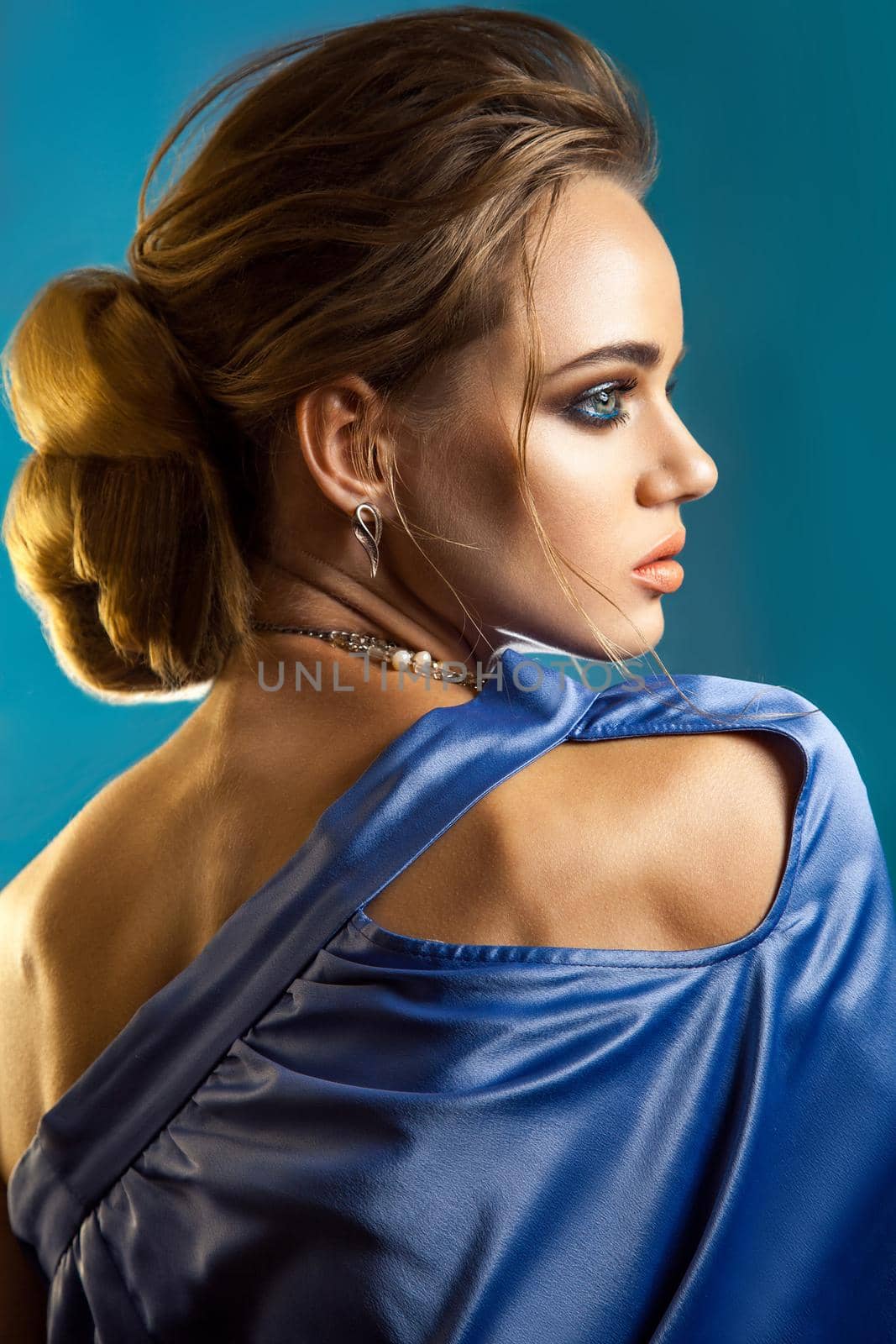 beauty portrait of stylish woman with elegant hairstyle and makeup with blue dress by Khosro1
