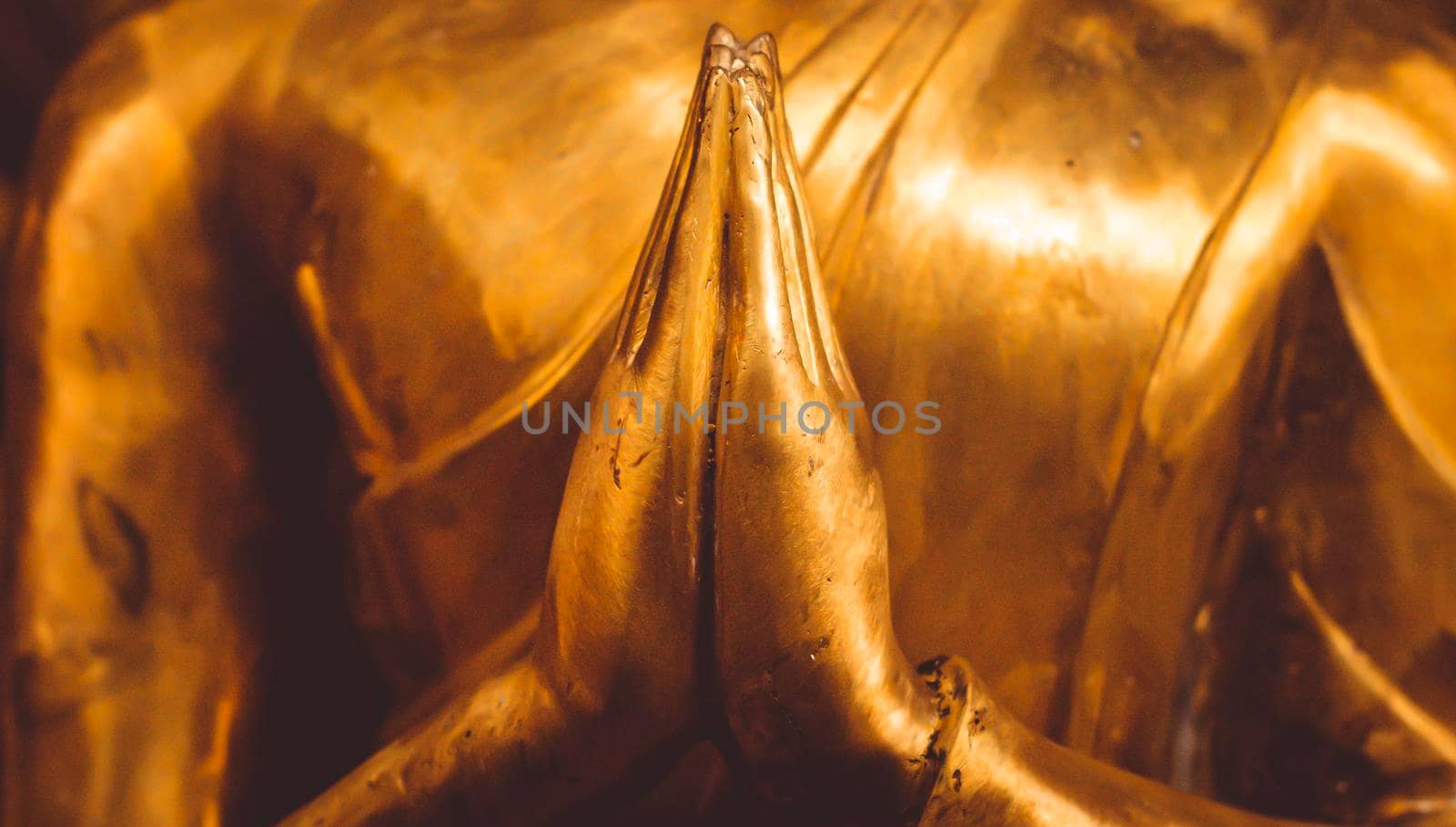 Close up hand of statue Buddha.buddhism concept . focus and peacefulness concept idea by Petrichor