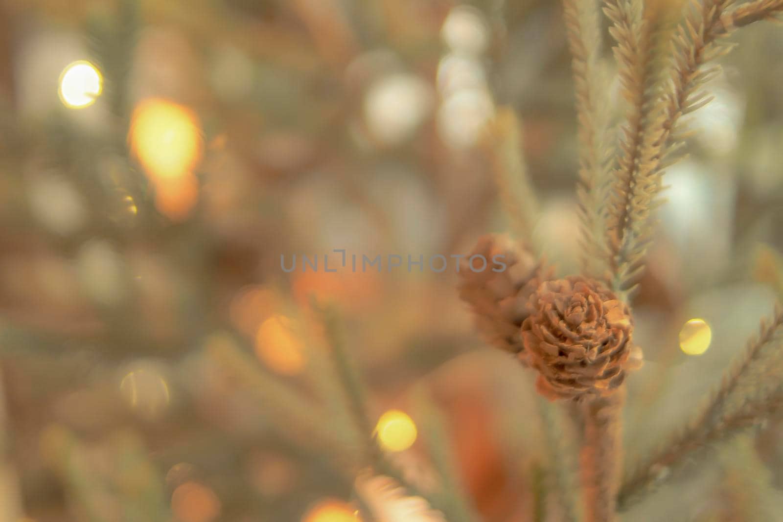 Gold Christmas background of de-focused lights with decorated tree. Decorated Christmas tree on blurred background. Happiness moment . New year background by Petrichor