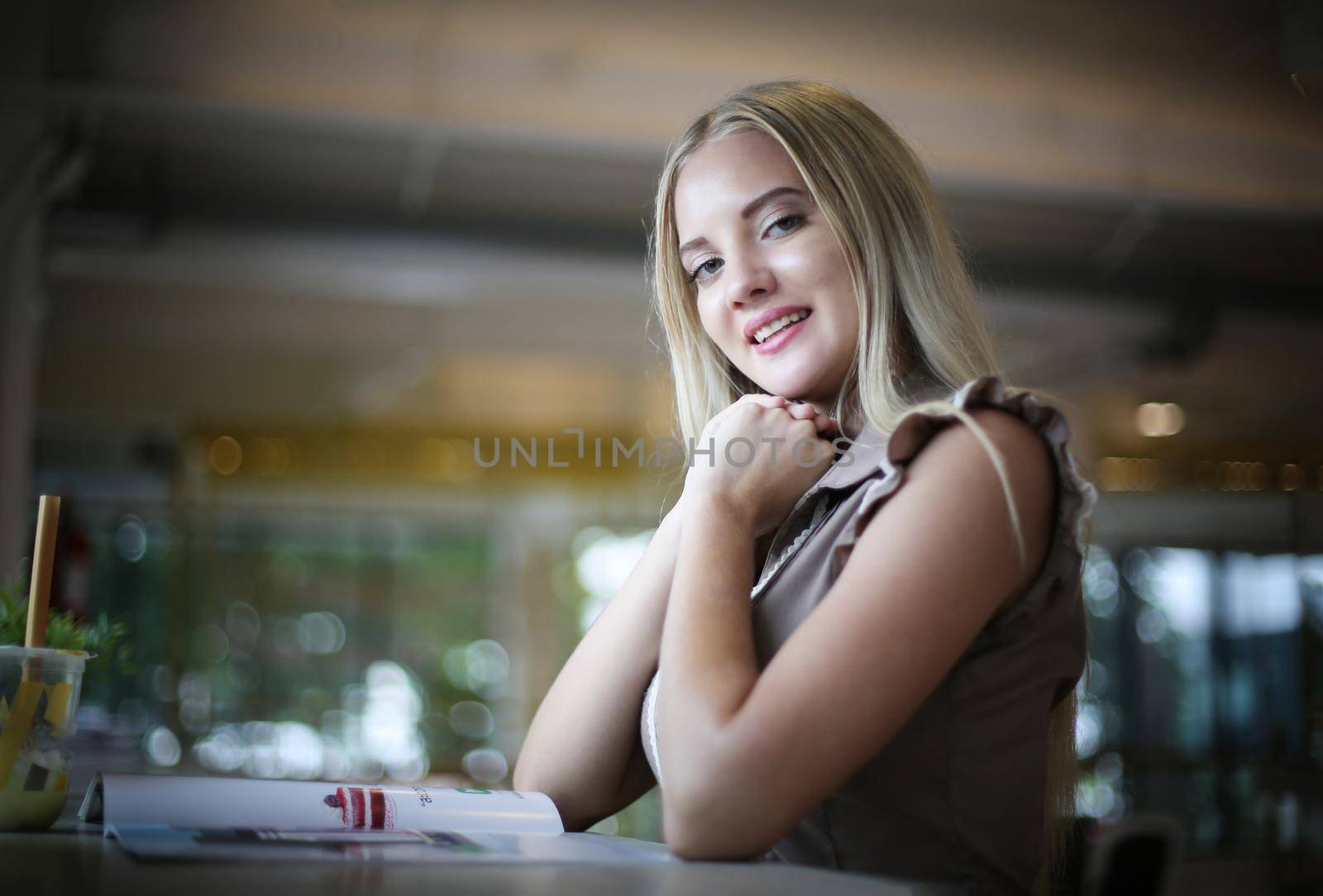 portrait young beautiful blond hair women smiling at camera.
