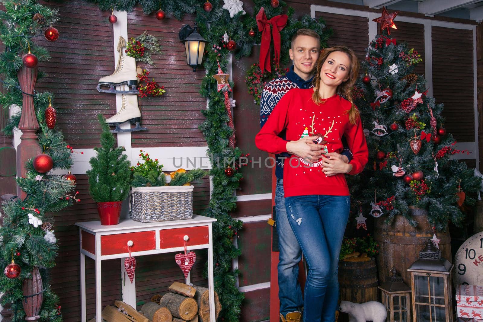 Young beautiful love couple celebrating new year. by Khosro1