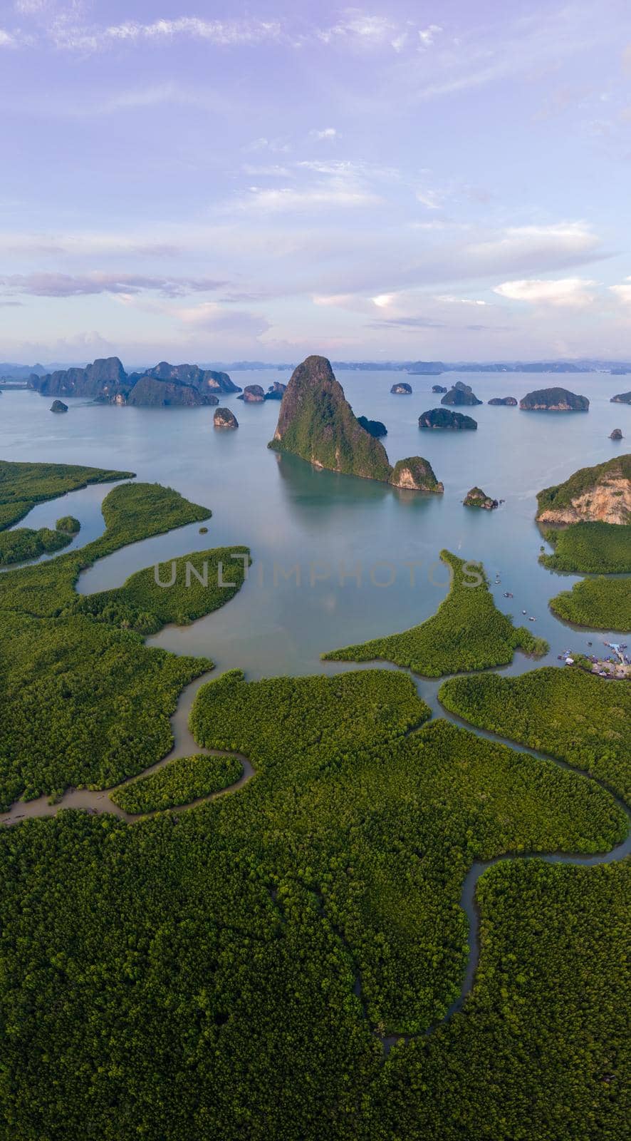 panorama view of Sametnangshe, view of mountains in Phangnga bay with mangrove forest in andaman sea with evening twilight sky, travel destination in Phangnga, Thailand